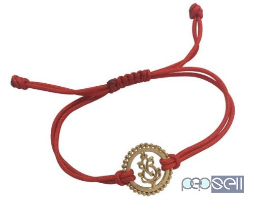 Gold Plated Ganesh Rakhi In Silver On Free Size Adjustable Thread at Rs. 1100 by Aumkaara  0 