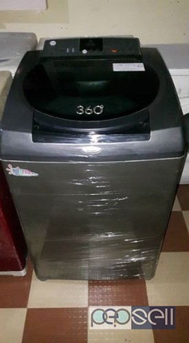 Whirlpool 6th sense 8kg top load fully automatic washing machine, double door fridge Samsung 5star . 0 
