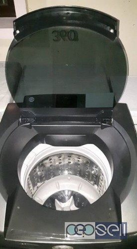 Whirlpool 6th sense 8kg top load fully automatic washing machine, double door fridge Samsung 5star . 5 