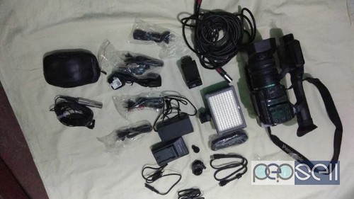 Panasonic HX-C1000 Camera+ Tripod(E-Image)+Light unit 2 