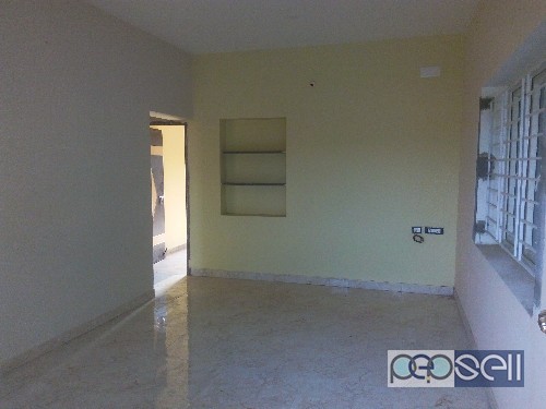  2 BHK East-facing semi furnished flat with carparking for immediate sale. 1 