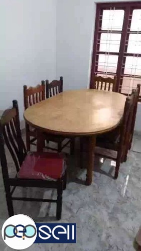 Teakwood dining table and 4 chairs for sale in Kozhikode 0 