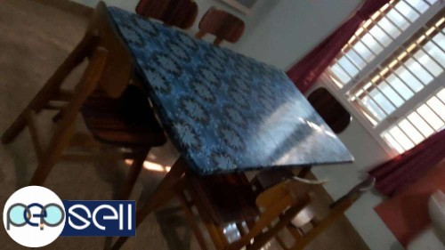 Used Teakwood Dinning table and chairs for sale in Palakkad 1 