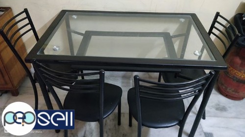 4 Seater Dinner Table - Metal body with Teakwood frames and Glass top 1 