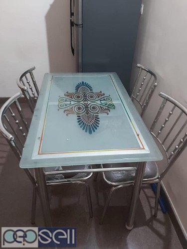 Ss dining table with top glass and ss chair for sale 0 
