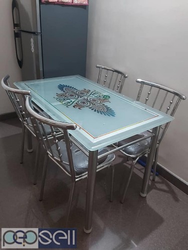 Ss dining table with top glass and ss chair for sale 1 