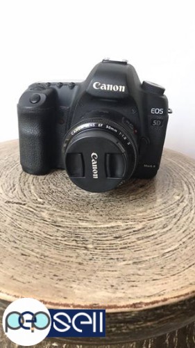 Canon 5d mark ii 50 mm lens & battery ... good condition 1 