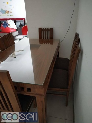 Dining table and 6 seater chair hardly used for 1 year for sale 1 