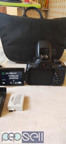 Canon D700 Touchscreen Display Video Recording DSLR Camera with Bill Accessories.. 1 