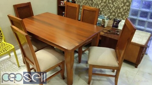 Teak wood Dining table I paid 53000at Damro I am selling for 20000 4 